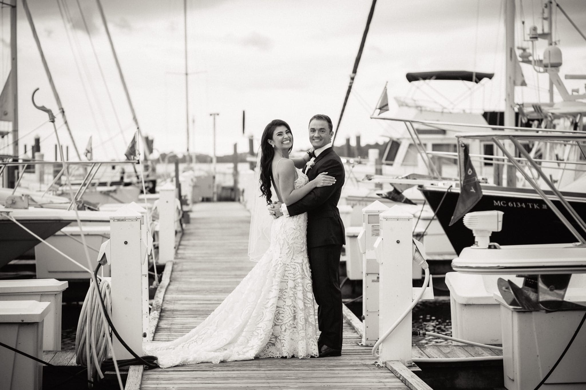 bride and groom portrait on a dock