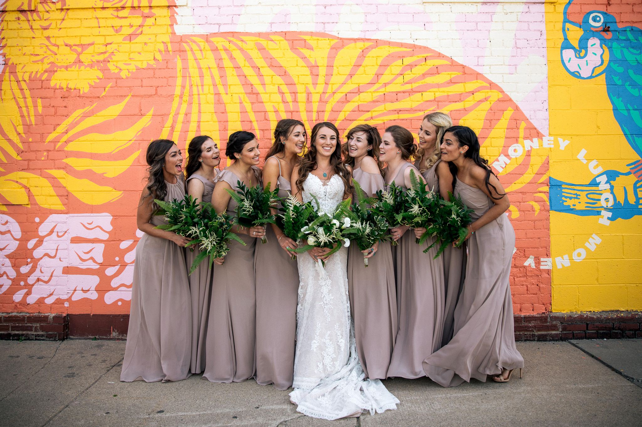 Bridal party in front of mural Detroit