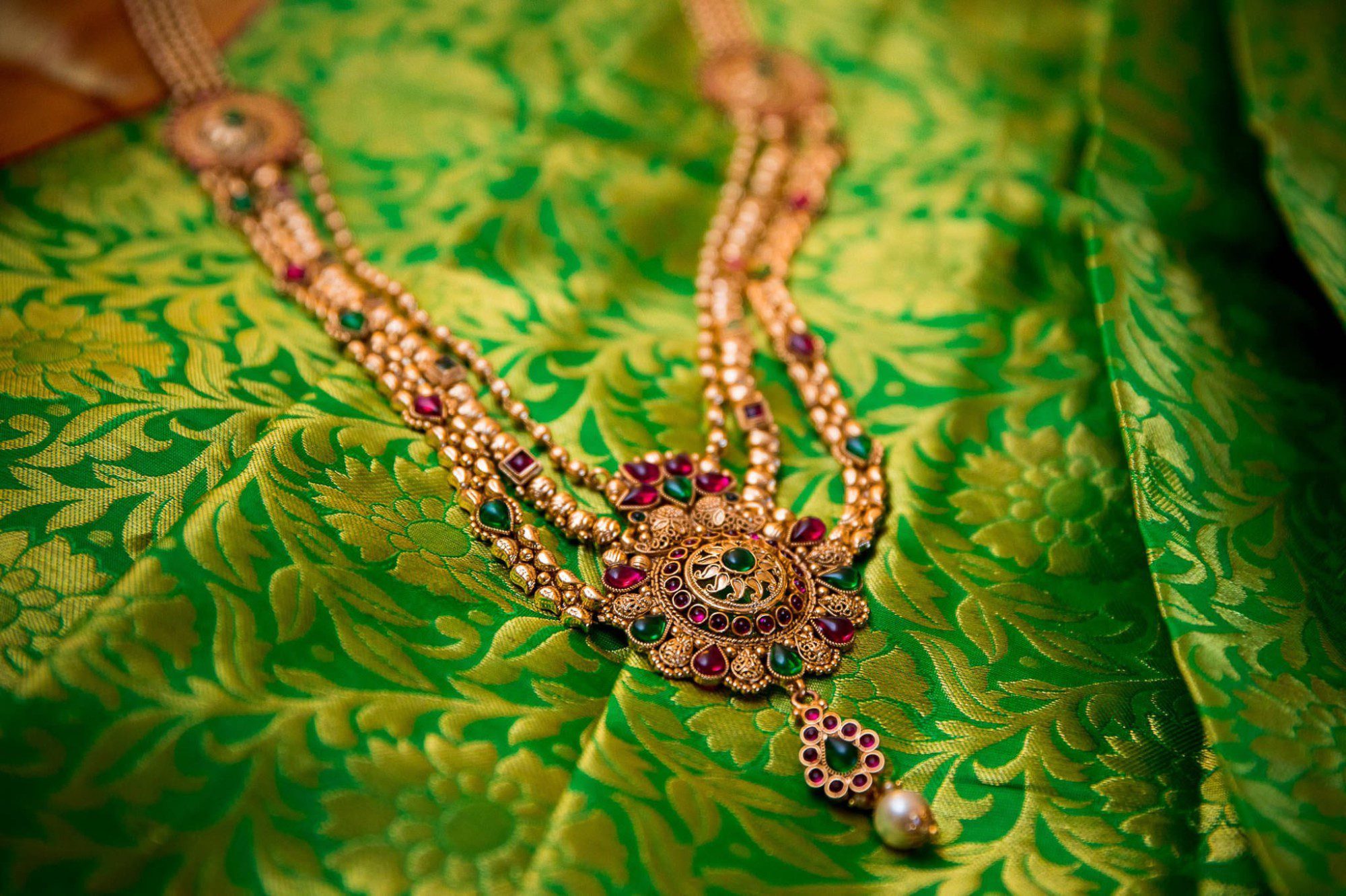 Indian wedding jewelry displayed on fabric