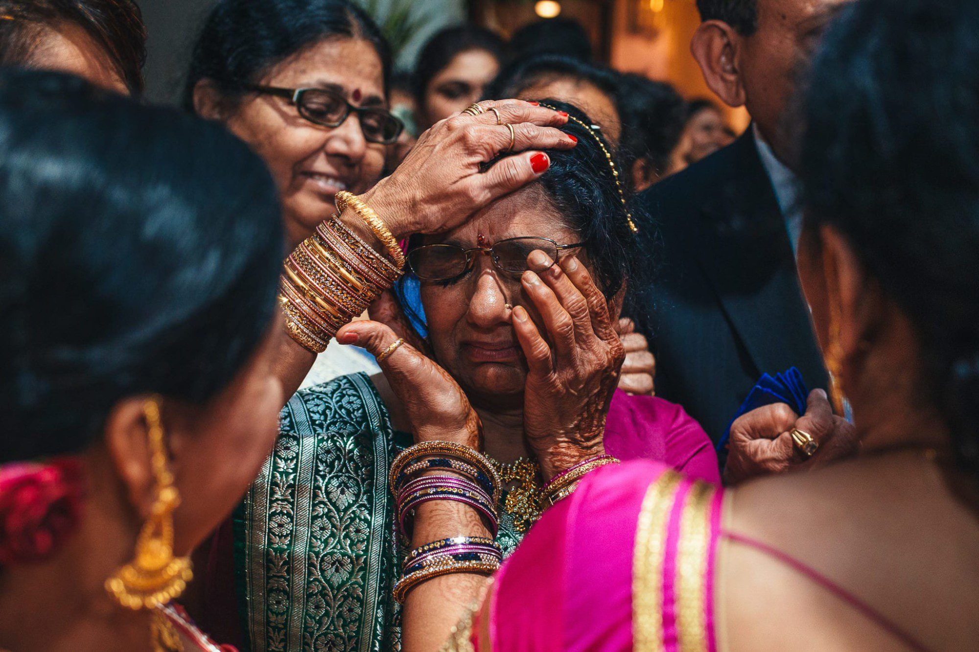 mother of Indian bride crying during the Vidaai ritual