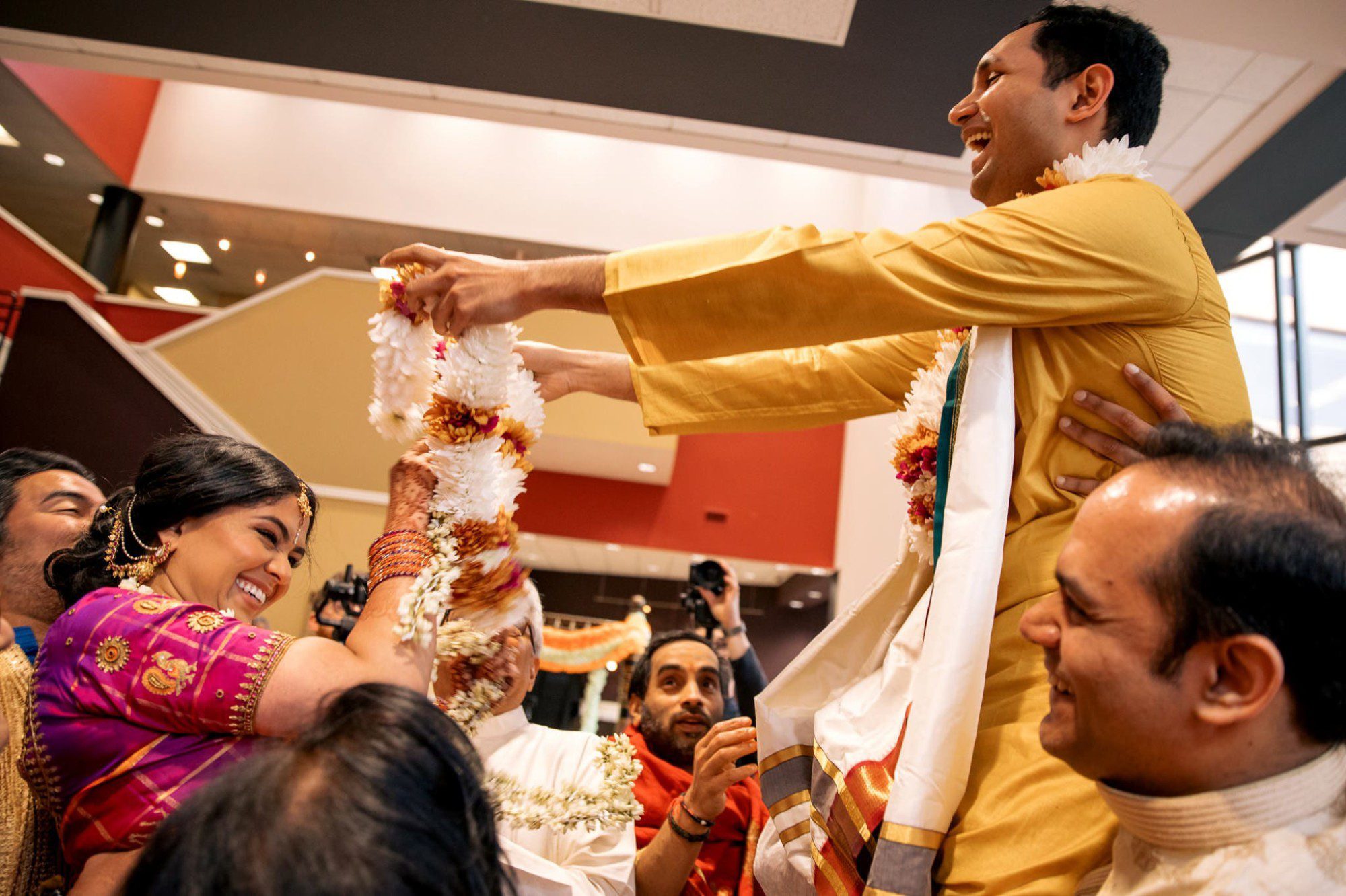Indian couple exchange of garlands
