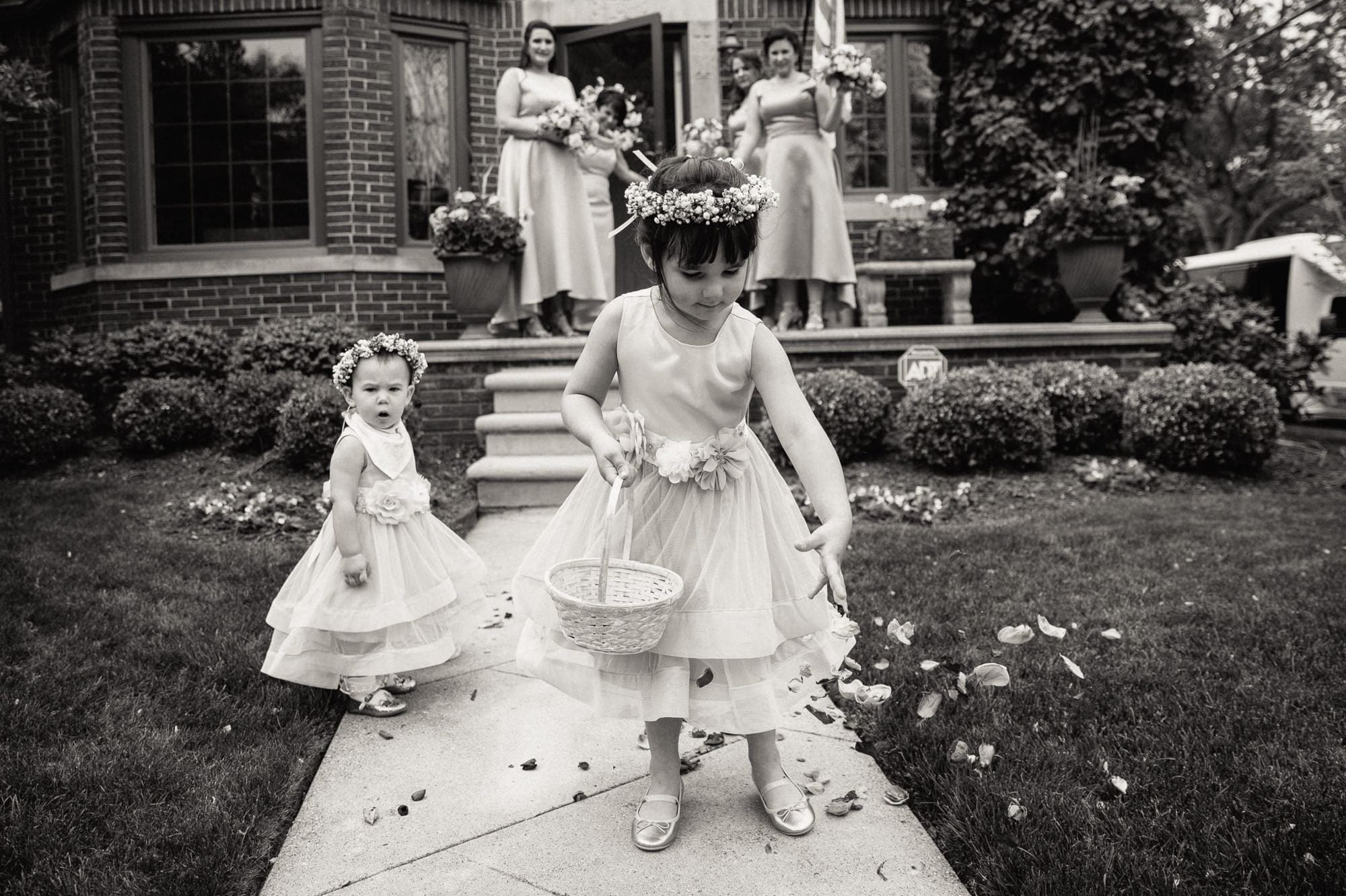 flower girl dropping flower pedals