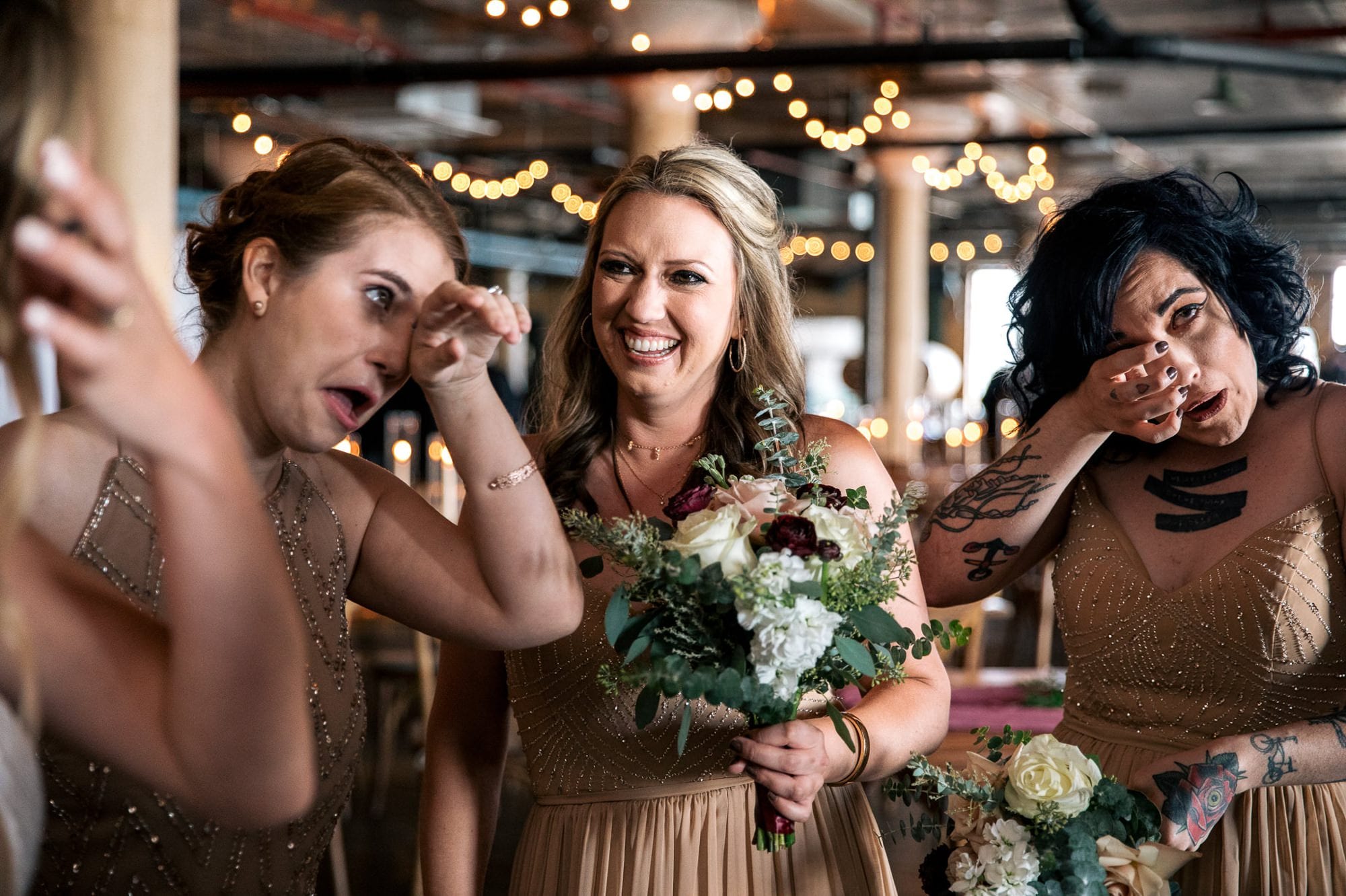 bridesmaids crying after wedding ceremony at Whiskey Factory