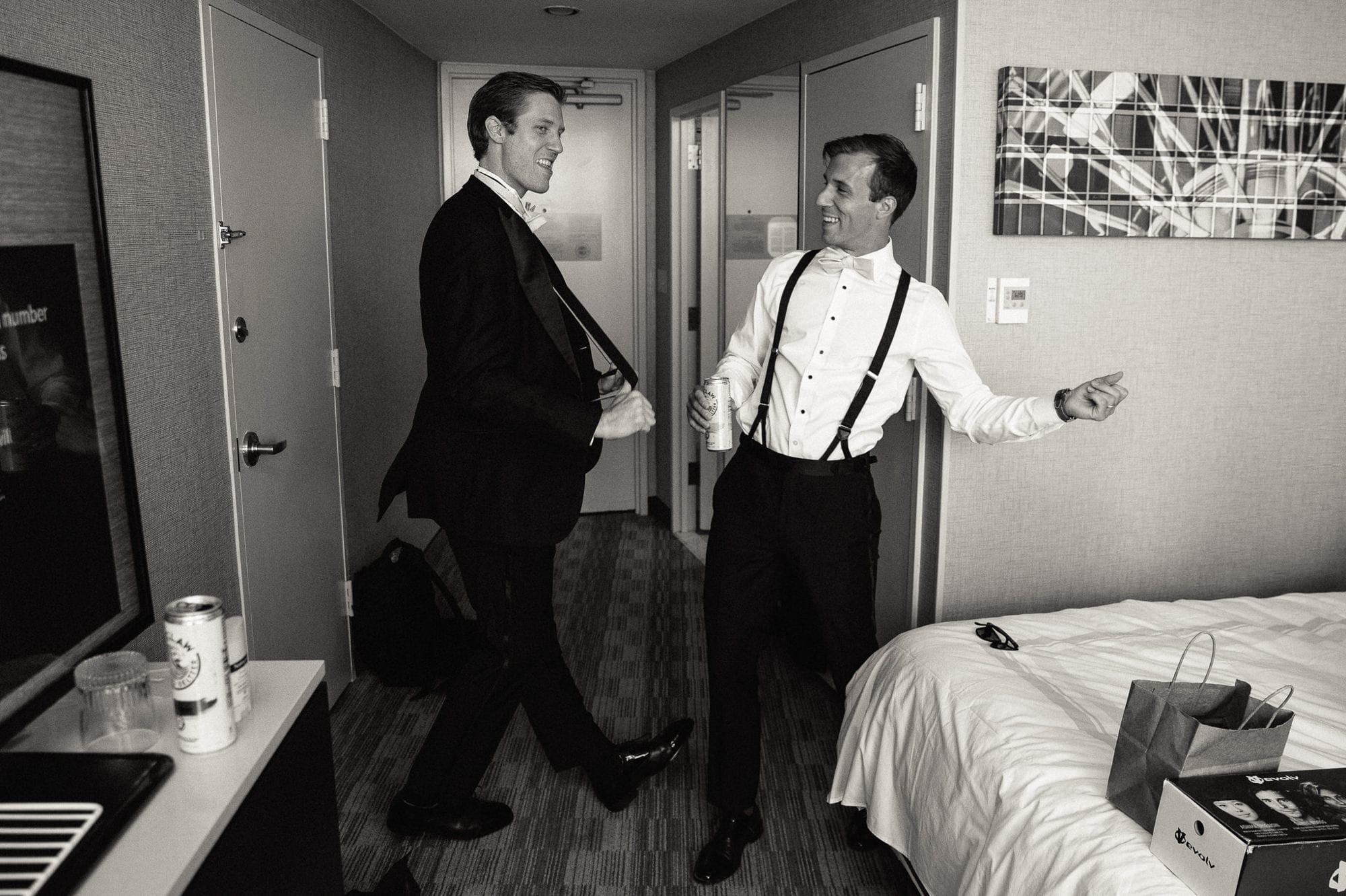 groomsman dancing in hotel room