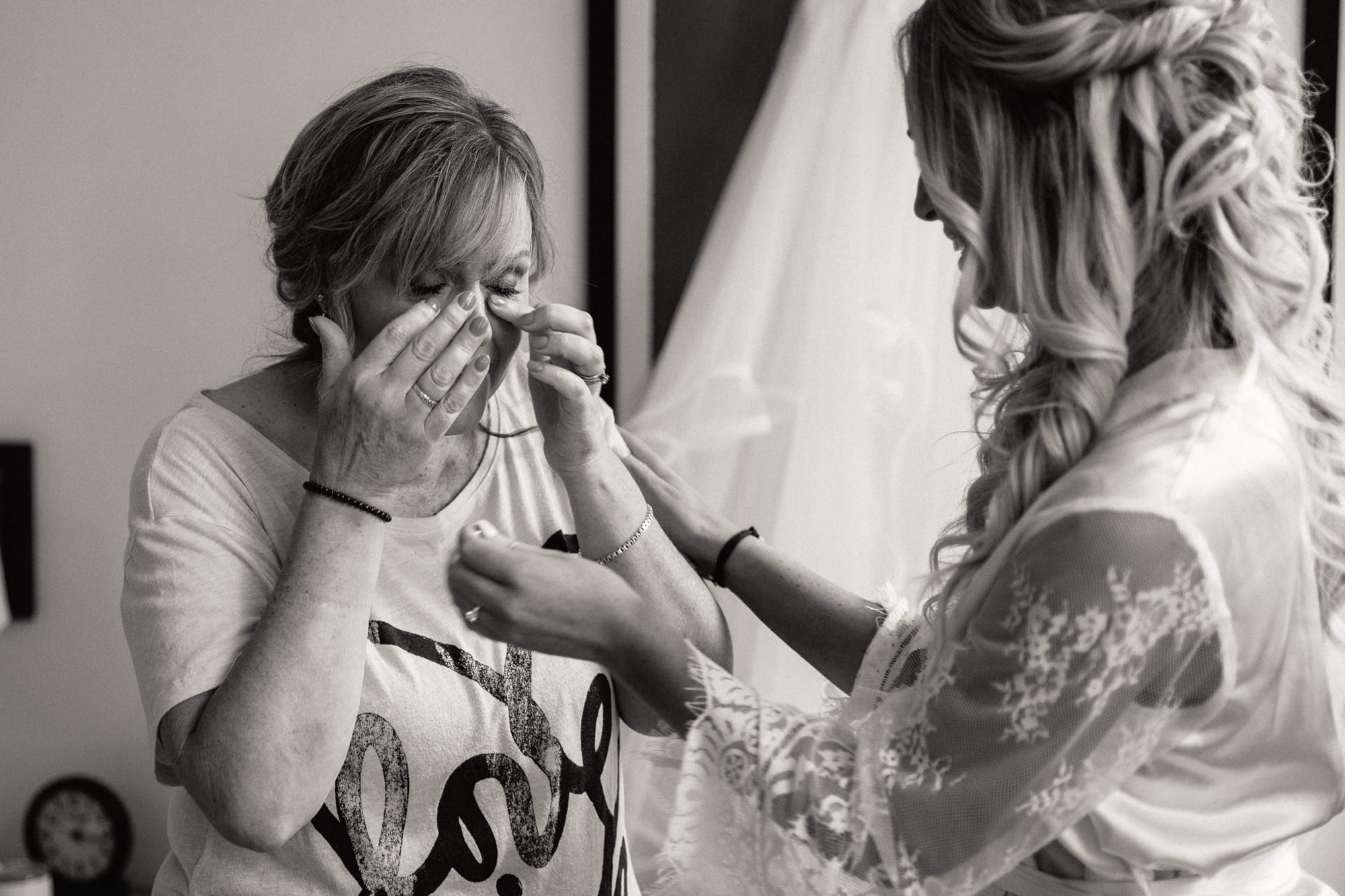 mother crying after seeing bride