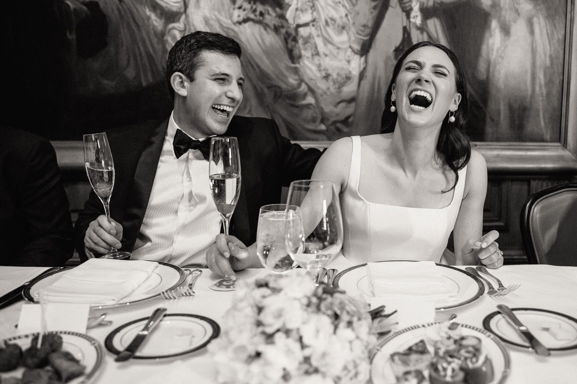 bride and groom laughing during DAC reception