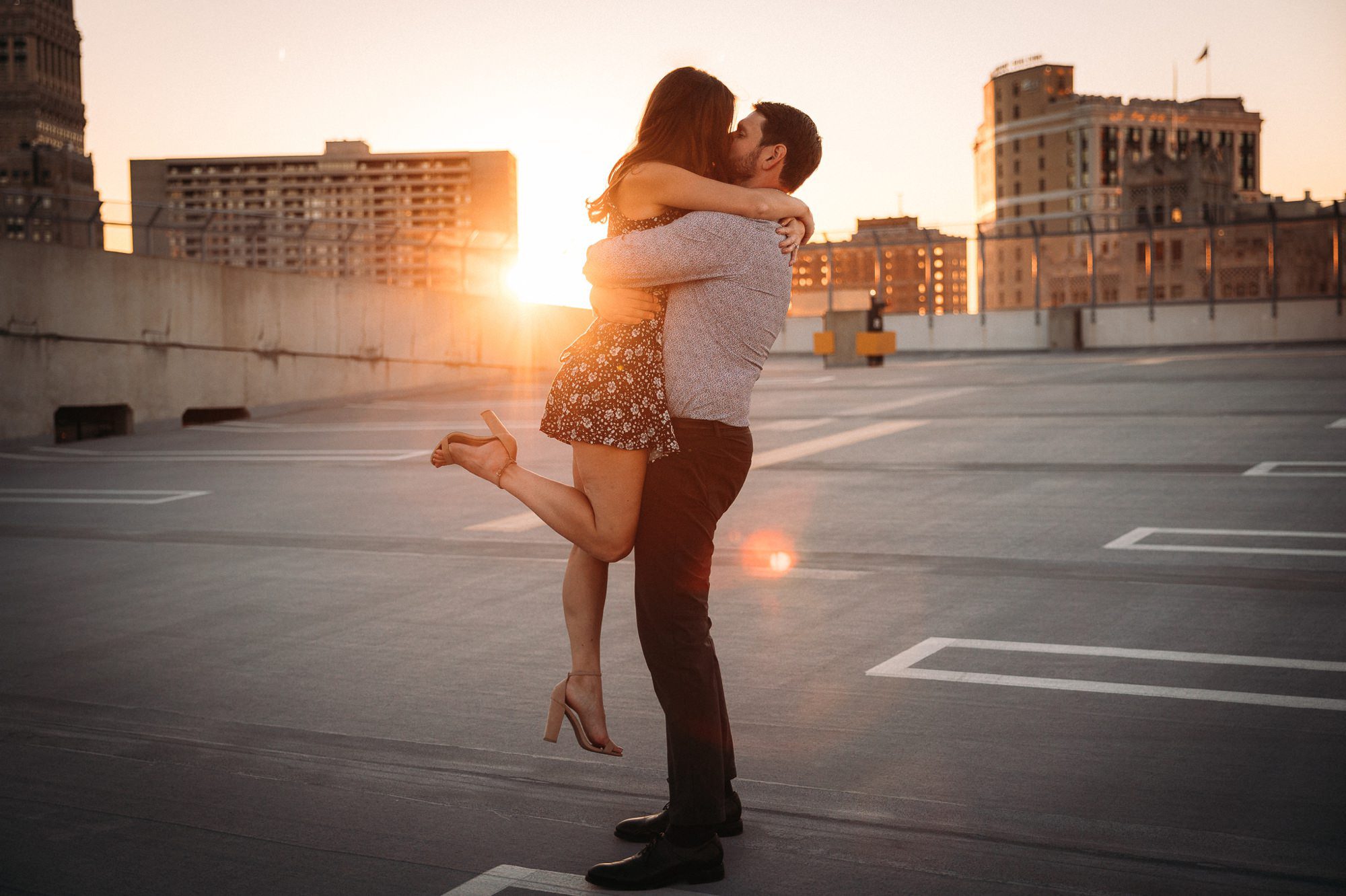 Couple kissing on Detroit rooftop