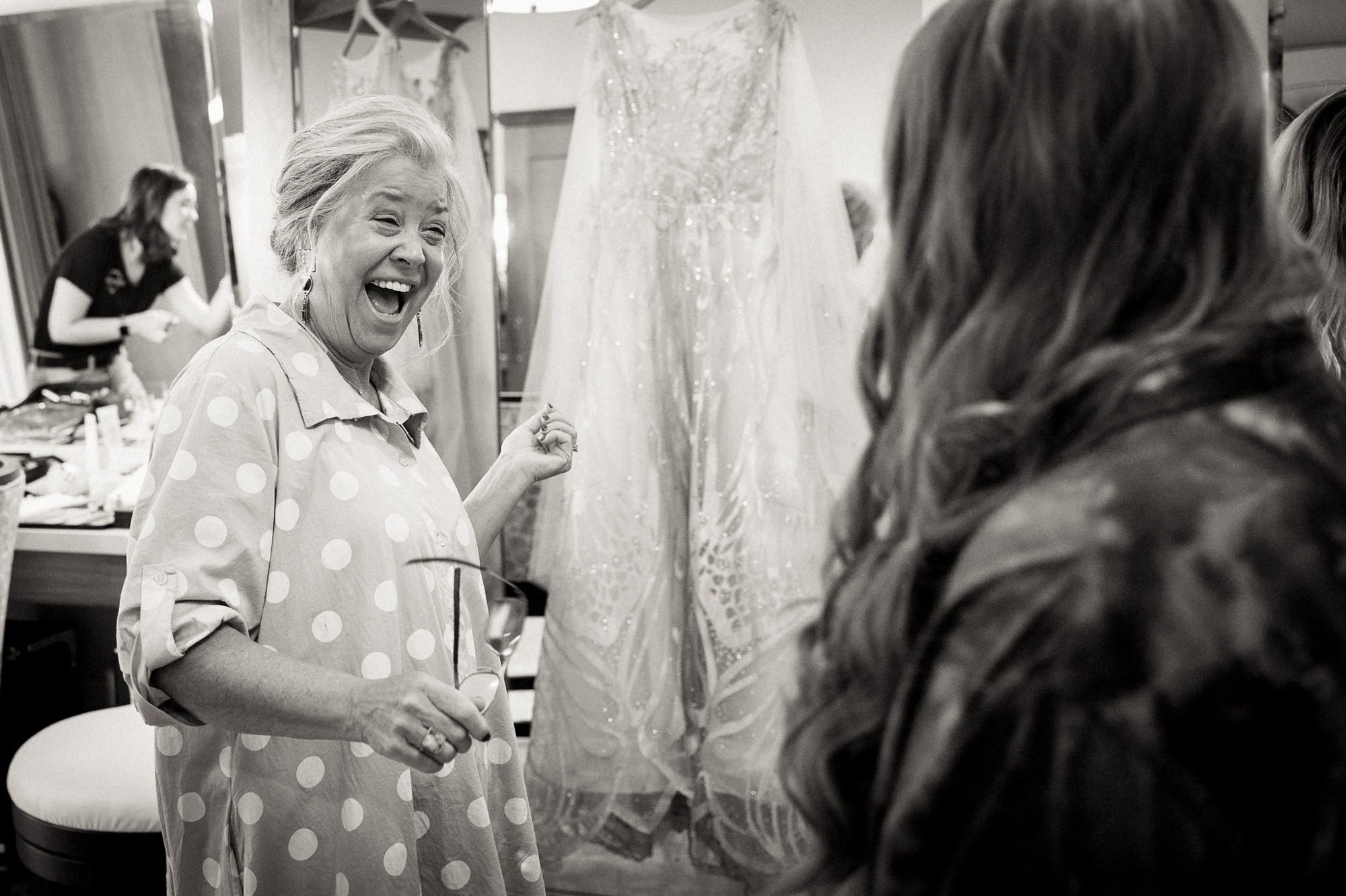 woman excited about wedding dress