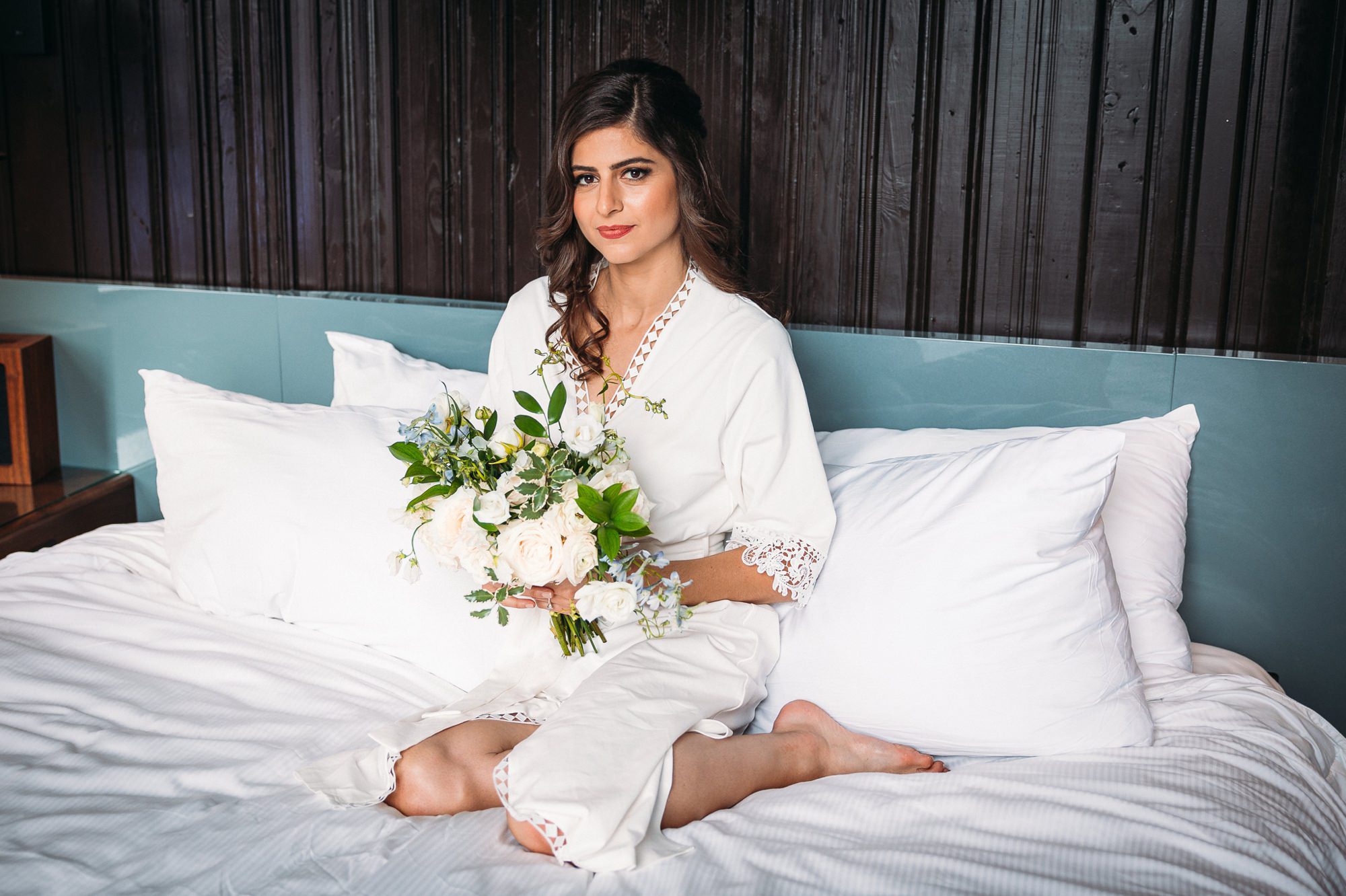 bride posing on bed