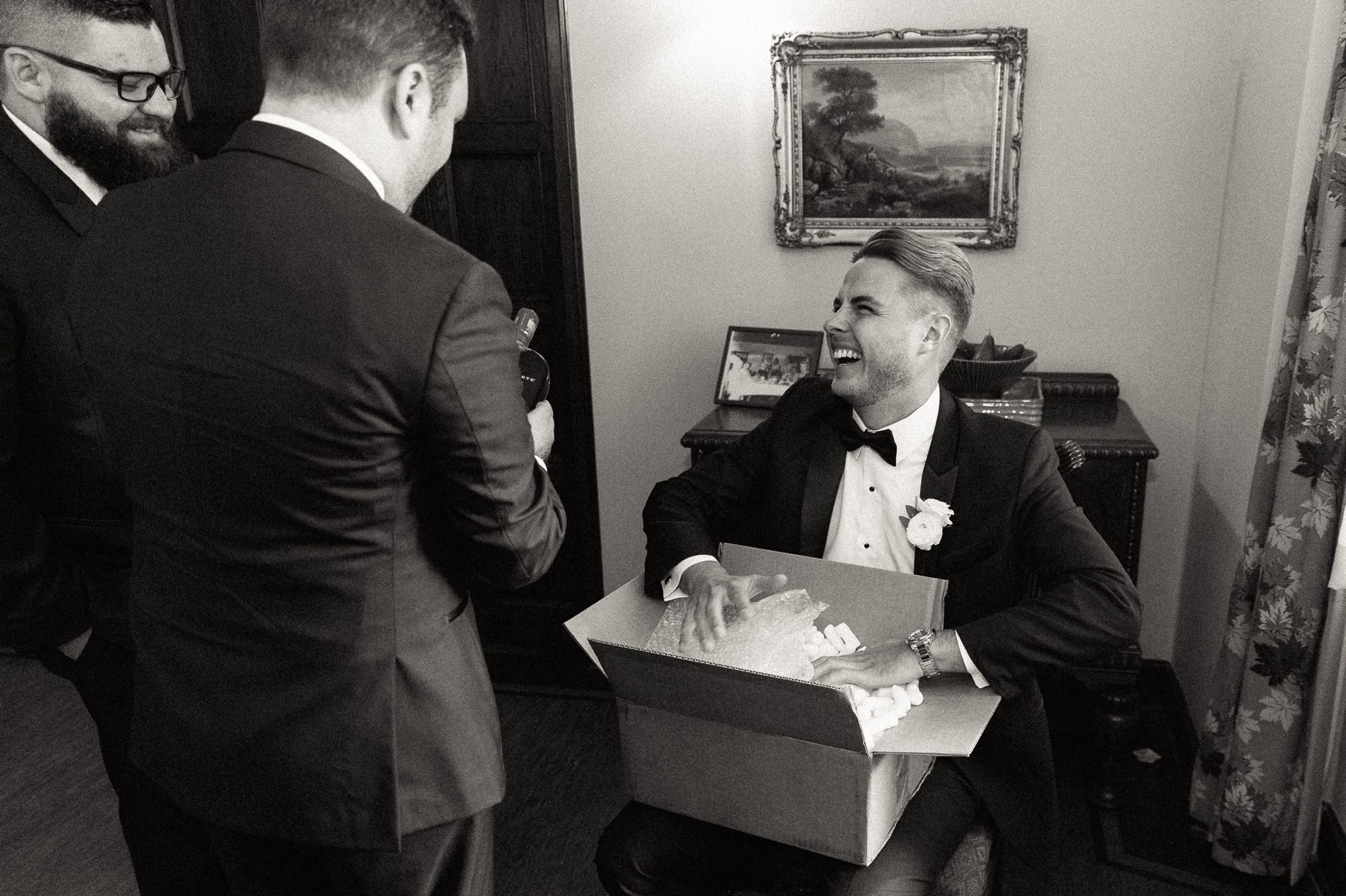 groom opening a gift