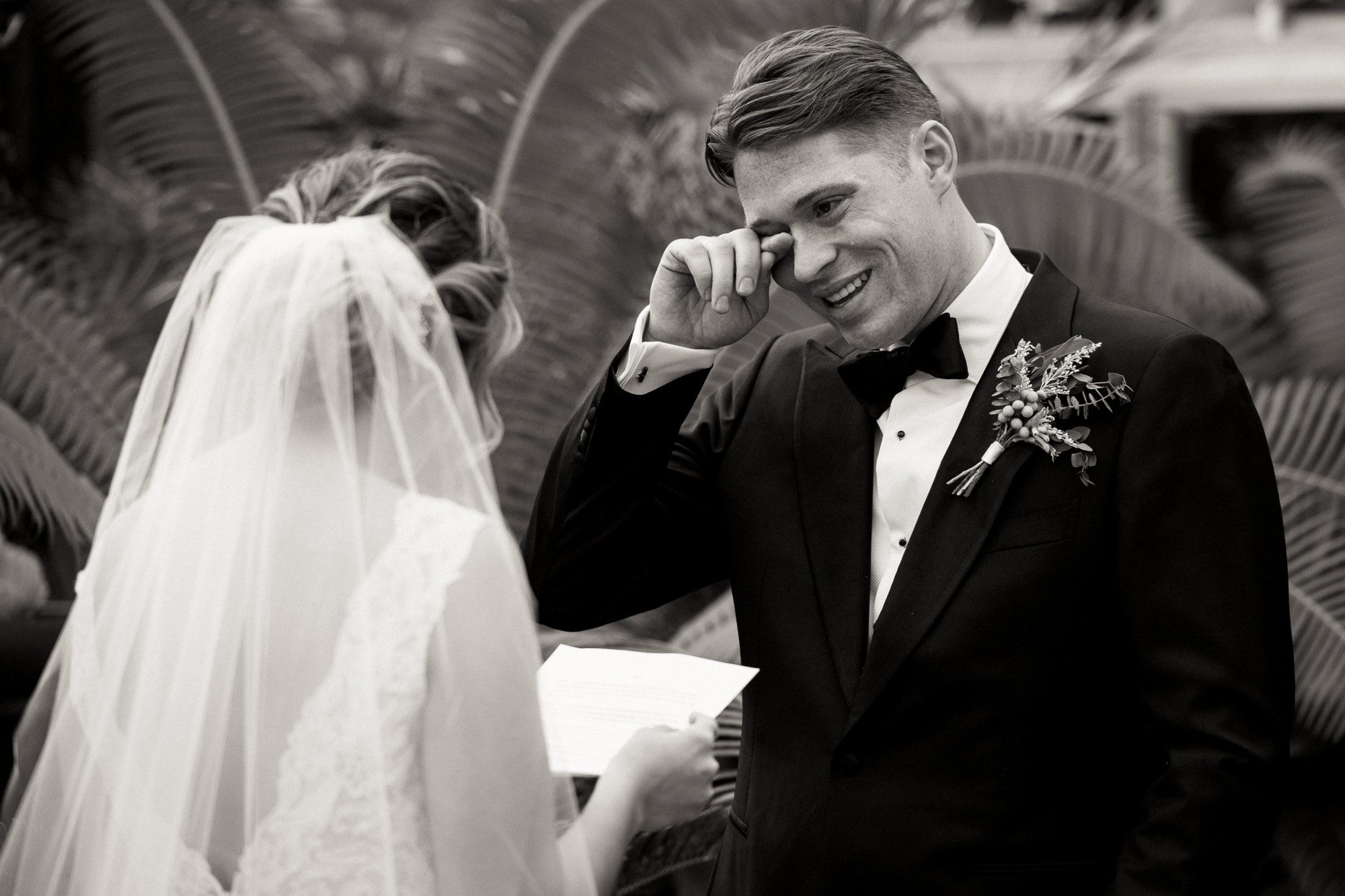 groom crying during first look