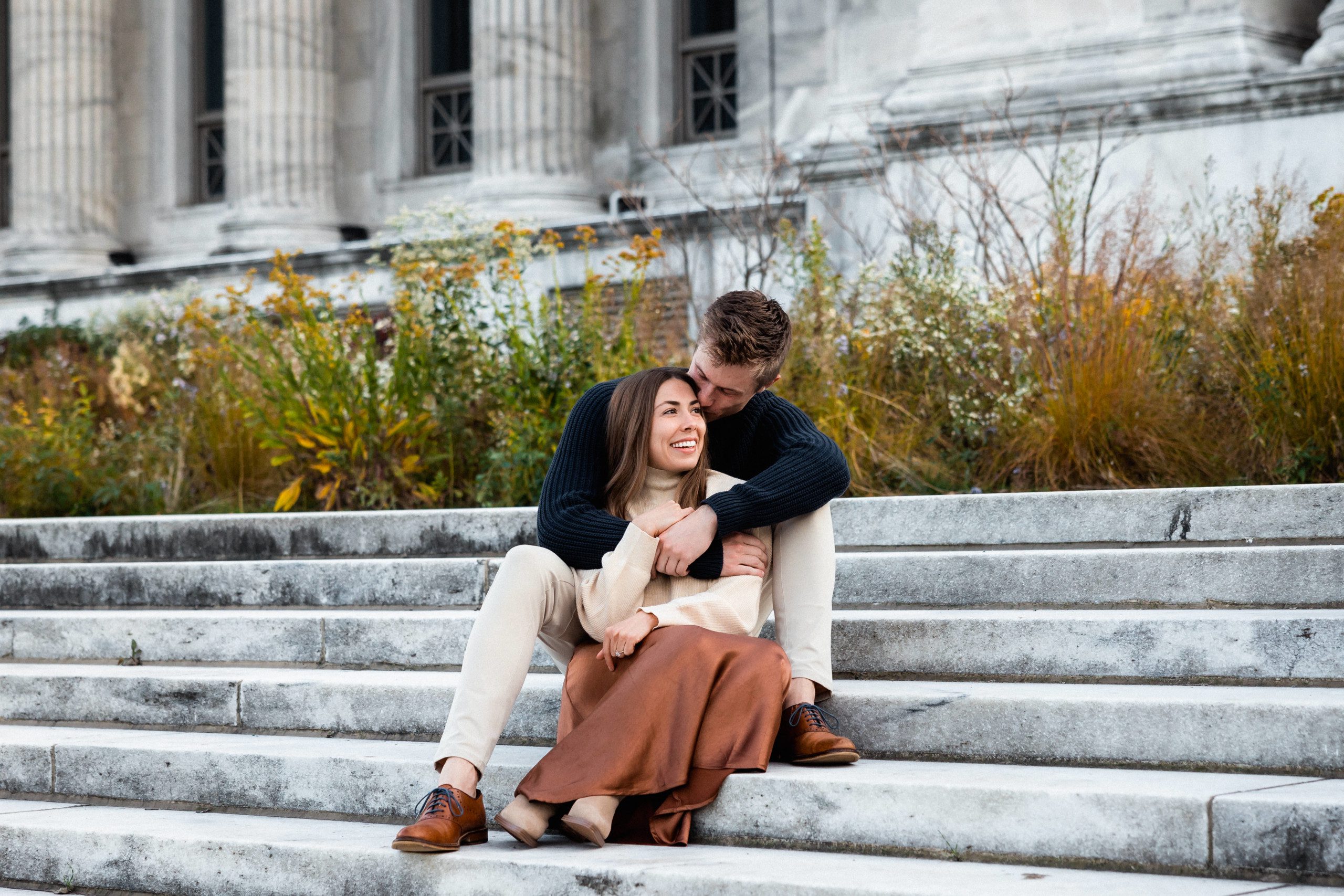 couple hugging on steps