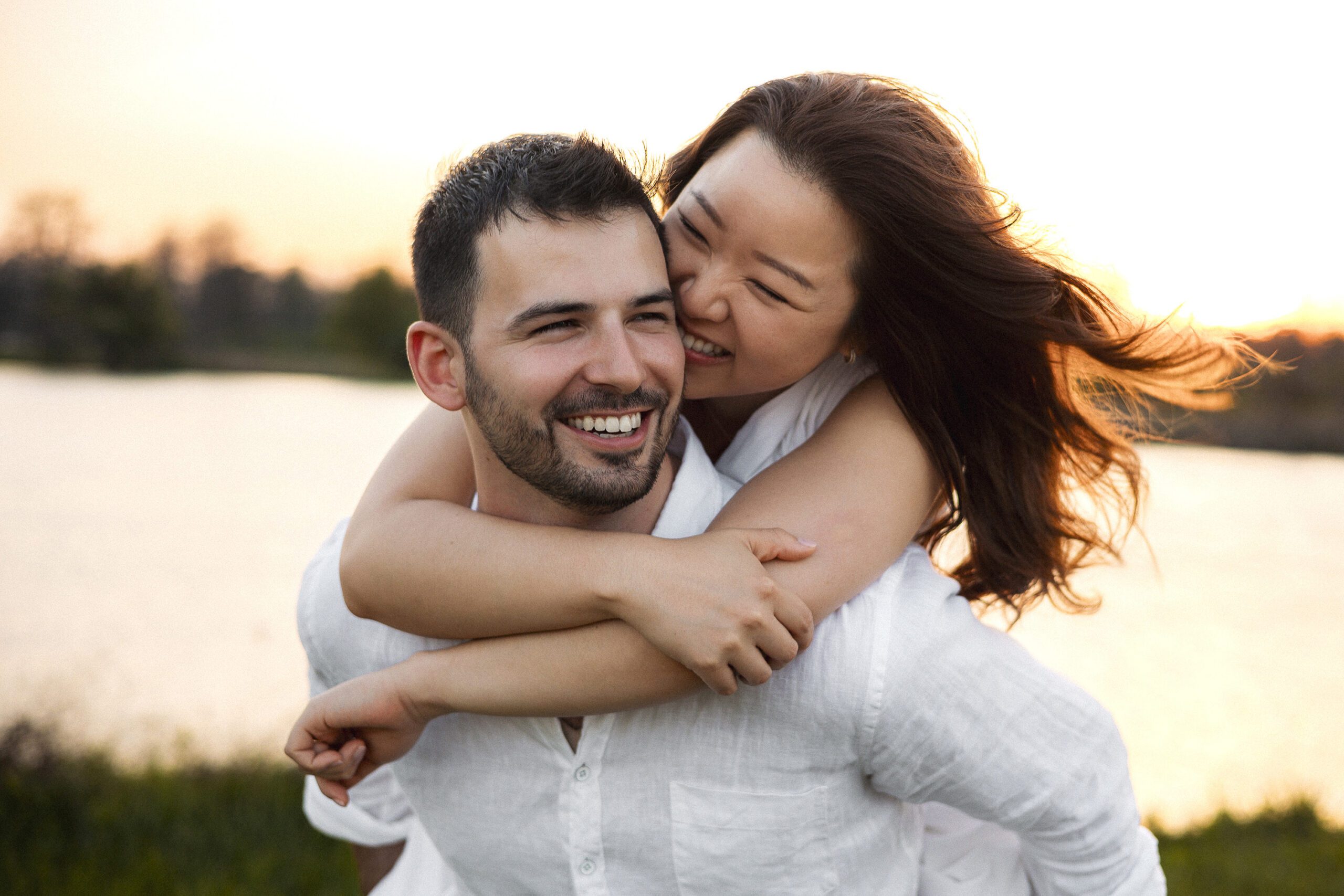 Natural engagement portrait at Belle Isle Park during sunrise