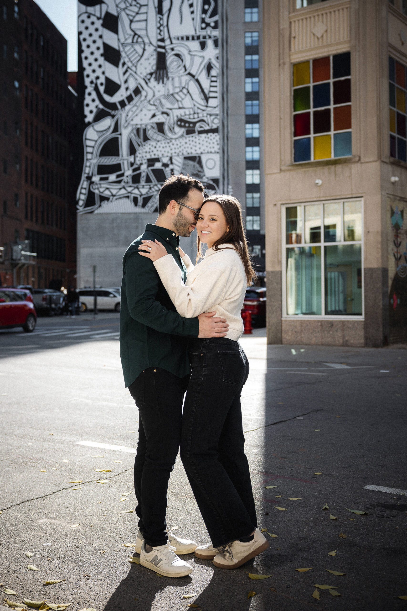 Engaged couple exploring historic downtown Detroit
