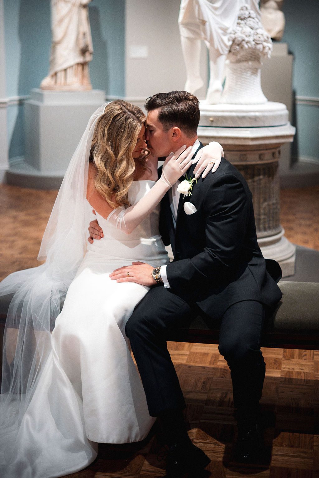 Bride and Groom Embrace in Gallery at DIA Wedding