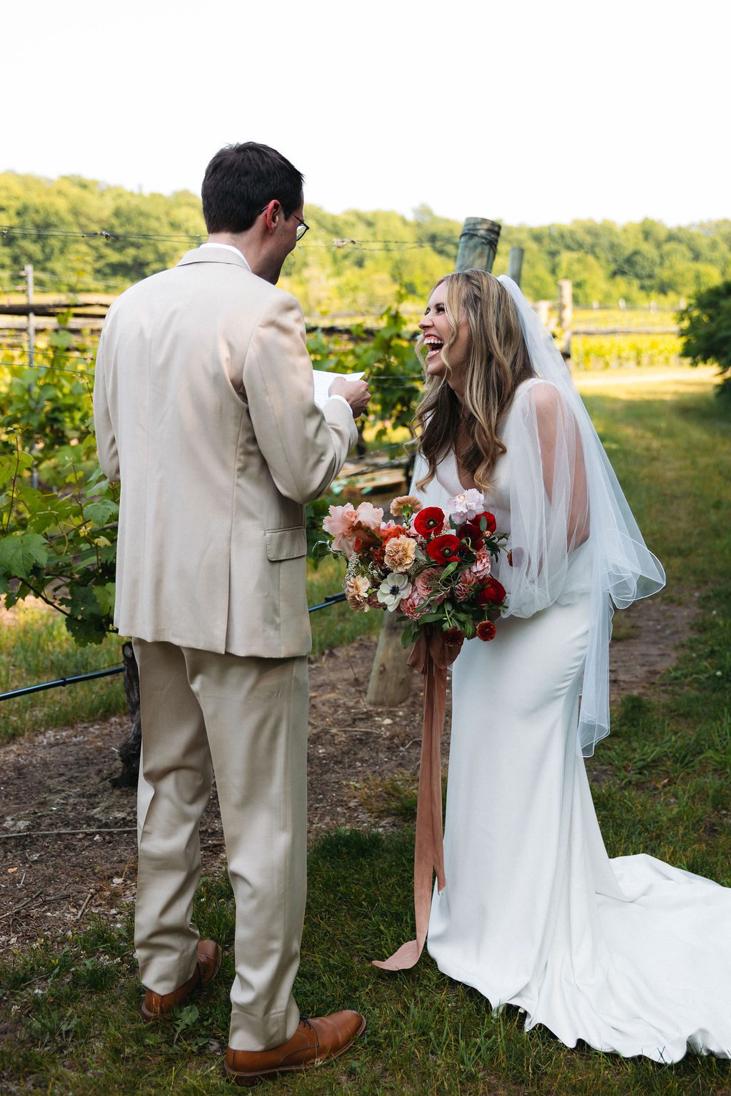 Bride Laughing During Outdoor Wedding Ceremony at Brengman Family Wines
