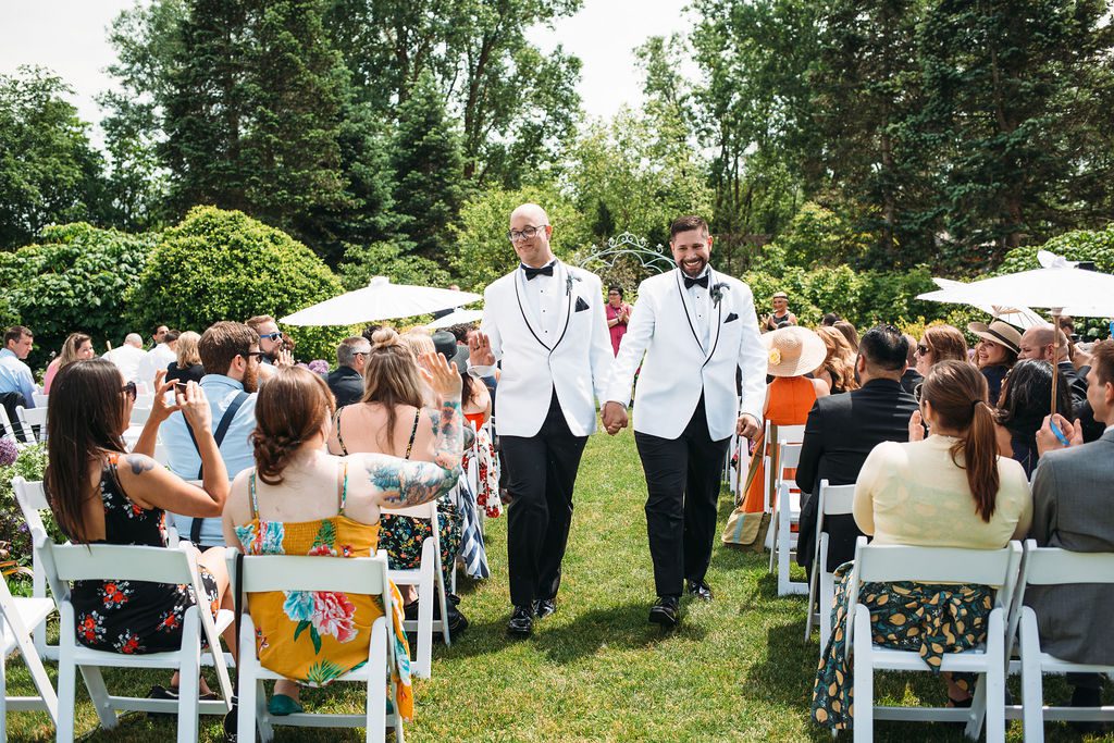 Grooms Walk Down Aisle, High Five Guest, After Wedding Ceremony